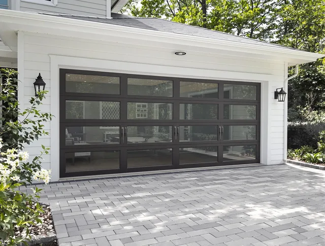 Bethel Garage Door Repair design specialist presenting custom garage door options to Bethel homeowner
