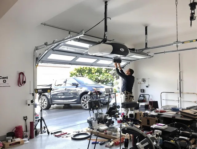 Bethel Garage Door Repair specialist installing smart garage door opener system in Bethel home