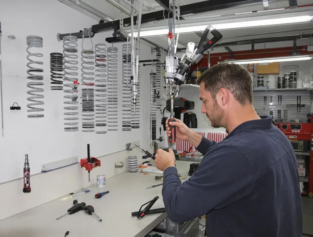 Bethel Garage Door Repair safety certified technician performing precision spring replacement in Bethel