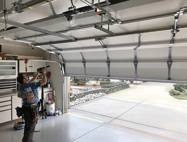 Garage door track repair service by Bethel Garage Door Repair in Bethel